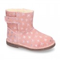 Print Suede leather Boots with hook and loop strap closure and fake hair lining.