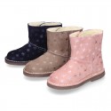 Print Suede leather Boots with hook and loop strap closure and fake hair lining.