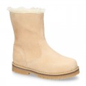 COUNTRYSIDE Suede leather ankle boots with zipper closure.