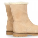 COUNTRYSIDE Suede leather ankle boots with zipper closure.