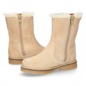 COUNTRYSIDE Suede leather ankle boots with zipper closure.