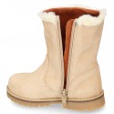 COUNTRYSIDE Suede leather ankle boots with zipper closure.