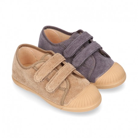 CORDUROY canvas kids tennis shoes with hook and loop closure and toe cap.