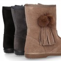 Classic kids suede leather boots with FAKE HAIR POMPONS design.