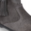 Classic kids suede leather boots with FAKE HAIR POMPONS design.