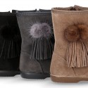 Classic kids suede leather boots with FAKE HAIR POMPONS design.