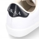 Washable Nappa leather OKAA kids tennis shoes with laces and toe cap.