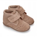 Classic kids suede leather little bootie Oxford style laceless and perforated design.