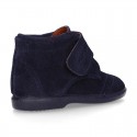 Classic kids suede leather little bootie Oxford style laceless and perforated design.