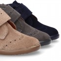 Classic kids suede leather little bootie Oxford style laceless and perforated design.