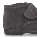 Classic kids suede leather little bootie Oxford style laceless and perforated design.