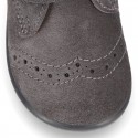 Classic kids suede leather little bootie Oxford style laceless and perforated design.