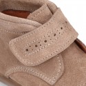 Classic kids suede leather little bootie Oxford style laceless and perforated design.
