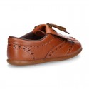 Laces up Oxford kids shoes with fringed tongue in TAN leather.