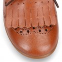 Laces up Oxford kids shoes with fringed tongue in TAN leather.