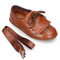 Laces up Oxford kids shoes with fringed tongue in TAN leather.