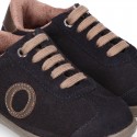 SPORT OKAA suede leather kids Tennis shoes with shoelaces closure.