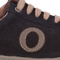 SPORT OKAA suede leather kids Tennis shoes with shoelaces closure.