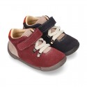 Suede leather Kids SPORT ankle boots with elastic laces and hook and loop strap closure.