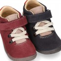 Suede leather Kids SPORT ankle boots with elastic laces and hook and loop strap closure.