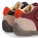 Suede leather Kids SPORT ankle boots with elastic laces and hook and loop strap closure.