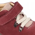 Suede leather Kids SPORT ankle boots with elastic laces and hook and loop strap closure.