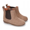 Suede leather little ankle boot shoes with elastic band a zipper closure design.