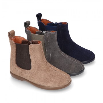 Suede leather little ankle boot shoes with elastic band a zipper closure design.
