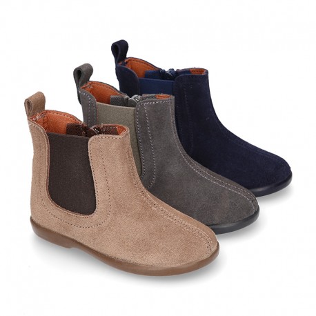 Suede leather little ankle boot shoes with elastic band a zipper closure design.