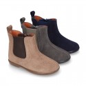 Suede leather little ankle boot shoes with elastic band a zipper closure design.