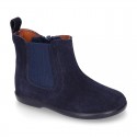 Suede leather little ankle boot shoes with elastic band a zipper closure design.