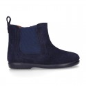 Suede leather little ankle boot shoes with elastic band a zipper closure design.