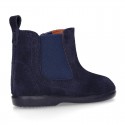 Suede leather little ankle boot shoes with elastic band a zipper closure design.