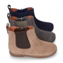 Suede leather little ankle boot shoes with elastic band a zipper closure design.