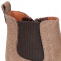 Suede leather little ankle boot shoes with elastic band a zipper closure design.