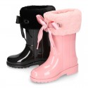SHINY COUNTRY style Rain boots with fake hair design and bow.