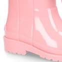 SHINY COUNTRY style Rain boots with fake hair design and bow.