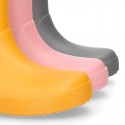 SOLID COLORS Rain boots with side buckle design for kids.