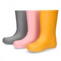 SOLID COLORS Rain boots with side buckle design for kids.