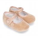 Velvet little Mary Janes for babies with hook and loop strap closure and button.