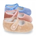 Velvet little Mary Janes for babies with hook and loop strap closure and button.