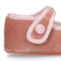 Velvet little Mary Janes for babies with hook and loop strap closure and button.