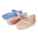 Velvet little Mary Janes for babies with hook and loop strap closure and button.