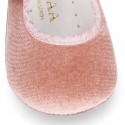 Velvet little Mary Janes for babies with hook and loop strap closure and button.