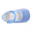 Velvet little Mary Janes for babies with hook and loop strap closure and button.