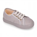 Autumn winter canvas OKAA kids tennis shoes to dress with shoelaces closure in pastel colors.