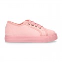 Autumn winter canvas OKAA kids tennis shoes to dress with shoelaces closure in pastel colors.