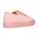 Autumn winter canvas OKAA kids tennis shoes to dress with shoelaces closure in pastel colors.