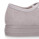 Autumn winter canvas OKAA kids tennis shoes to dress with shoelaces closure in pastel colors.