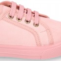 Autumn winter canvas OKAA kids tennis shoes to dress with shoelaces closure in pastel colors.